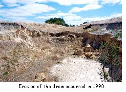 Erosion of the drain occurred in 1990